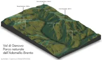 A 3d model of mountainous terrain showing a sinuous valley with its surrounding peaks. Titled: 'Val di Genova, Parco naturale dell'Adamello-Brenta' credits: 'by:tlohde / Copernicus Global DEM (ESA)' Labelled peaks are: Cima Presanella (3557 m), Monte Mandrone (3283 m), Cima Lancia (2318 m), Crozzon del Diavolo (3018 m), Corno di Lago Scuro (3164 m) & Cimon delle Gere (3016 m)